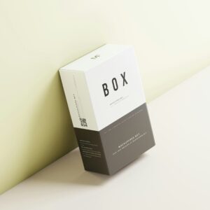 a box sitting on top of a table next to a wall
